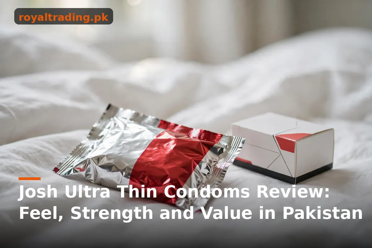Sealed condom foil packet and retail box on bedsheets, Josh Ultra Thin review
